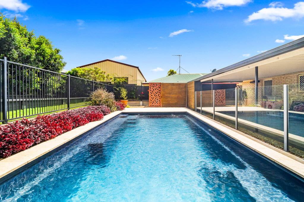 An outdoor pool area at a photoshoot in Tinana